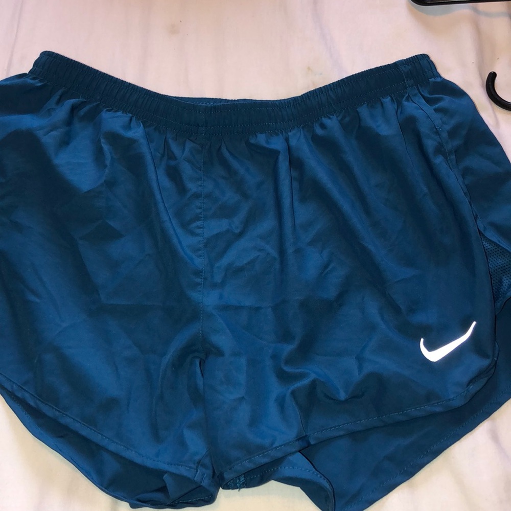blue nike dri-fit running shorts